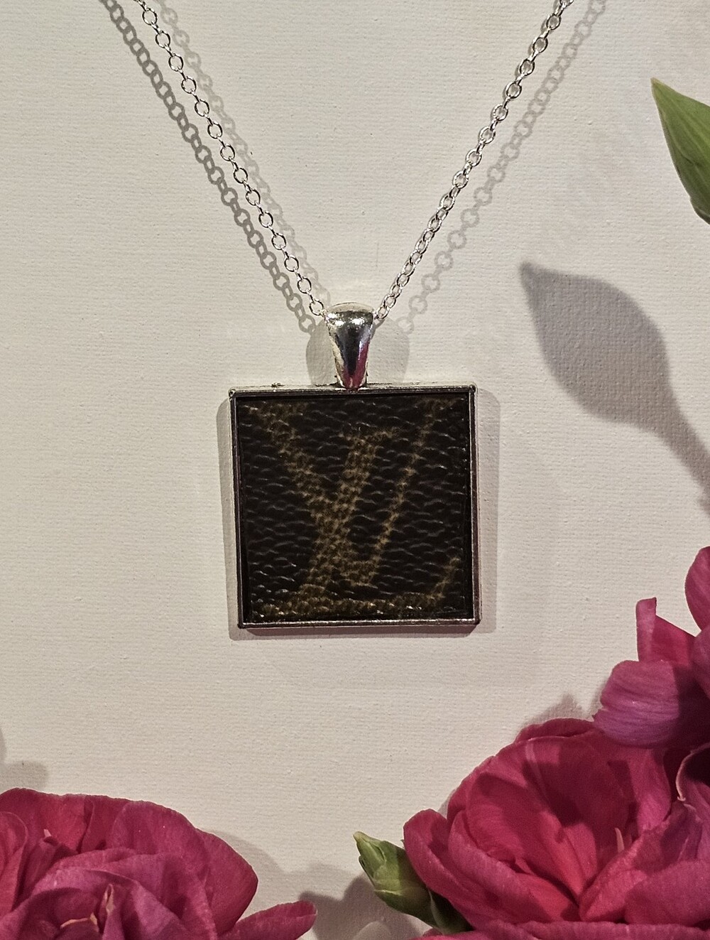Louis Vuitton Piece in Pendant on 24" Silver Plated Necklace